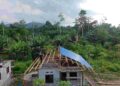 TNI Percepat Pembangunan Rumah Warga melalui Program TMMD Ke-128 di Kampung Tanah Rubuh