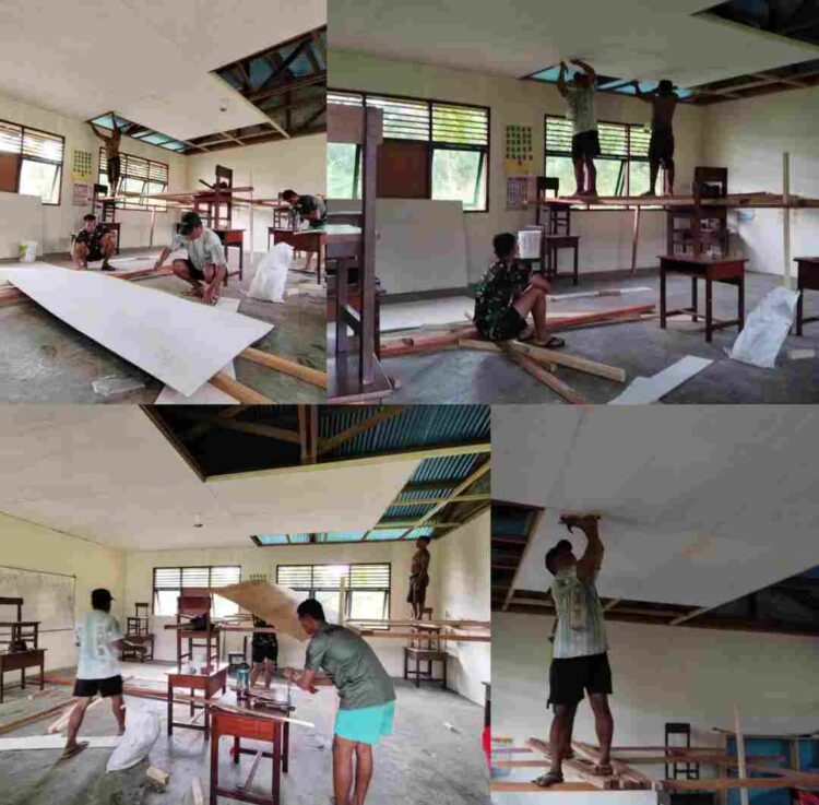 Satgas TMMD Ke-128 Kodim 1801/Manokwari Pasang Plafon Perpustakaan SD Inpres 62 Asai