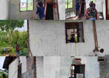 Satgas TMMD Ke-128 Kodim 1801/Manokwari Laksanakan Pengecatan RTLH di Kampung Tanah Rubuh
